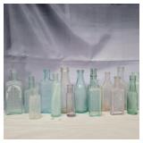15 glass bottles 3.5in-5.5in various colors