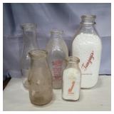 5 milk glass bottles