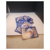 A Stack Of Over 65 Pokemon CardsRares,Halos,A