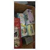 Porcelain doll assortment in box