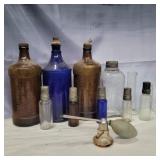 9 glass bottles, glass spray bottle, and more