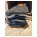 9 pair Of Blue Jeans and 2 pair Of khakis in sizes
