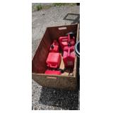Wooden box with fuel cans