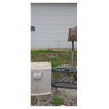Rubber maid cabinet and gardentool storage rack