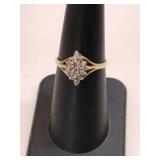10K cluster ring marked 10K size 6.     .070oz