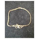 10k gold bracelet mom marked 10K.    .065oz