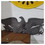 Black plastic eagle wall hanging 45in across