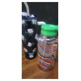 2 drink containers, blue one lid is broken