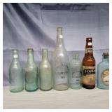 7 Logansport glass bottles