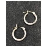 Silver hoop earrings unmarked.  .045oz