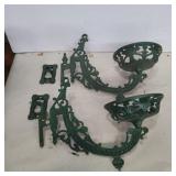 2 green painted cast iron oil lamp holders