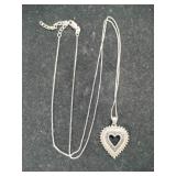 Silver heart pendant necklace marked 925.
