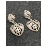 Silver heart-shaped post earrings marked 925.