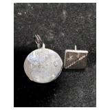 Silver pie pan and pendant Mark Sterling.