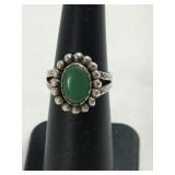Silver green turquoise ring marked Sterling size
