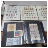3 stamp albums 1 full album, 1 partial, and empty