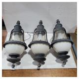 3 metal and glass outdoor lights