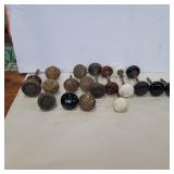 Assorted brass and glass door knobs