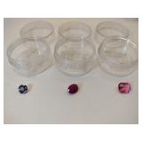 3 different pink &  purple gemstones