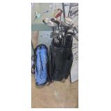 Golf clubs and 2 golf bags
