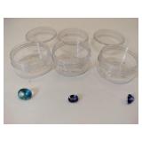 3 different blue and purple gemstones