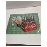 12 in x 17 in metal Coca-Cola sign