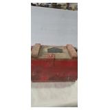 Red wooden crate with Winchester iron plaque