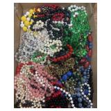 Costume jewelry, faux pearls, beads, etc.
