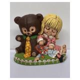 Signed 1974 hand-painted ceramic statue a girl,