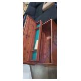 Lane red cedar chest with spinning wheel relief