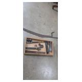 2 hand scythe, adjustable wrench, chain hook,