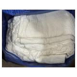 Cream colored textured throw blankets with
