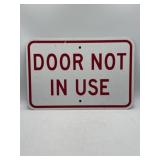 "Door not in use"  thick metal street sign, 19" x