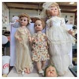 3 dolls and 1 doll head