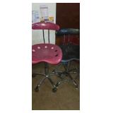 2 swivel stools with backs red and blue