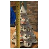 9in tall ceramic Christmas tree with santas. Not