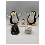Penguin plush toys, autographed baseball, a