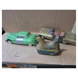 Tin and plastic cars and chicken toys as found