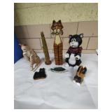 Lot of wood and ceramic cat & fish figurines.