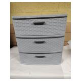 Three drawer plastic Sterilite storage cabinet.