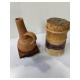 Unique pottery pitcher in  wood base. and pottery