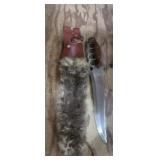 Novelty, knuckle knife with leather fur covered