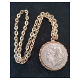 1883 Morgan silver dollar pendant gold tone chain