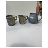 handmade studio art pottery mugs featuring blue