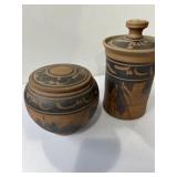handmade terracotta pottery jars with a matching