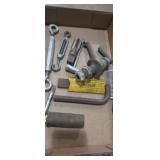 Sharpening stone, Allen key , tap, and twist tie