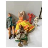 Barbie, micky figurine, witch figurine, and more