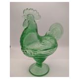 Green Glass pedestal resting hen