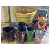 Mix of outdoor flower pots & a new adult poncho