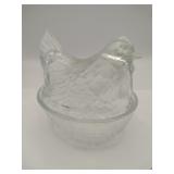 Clear glass resting hen
